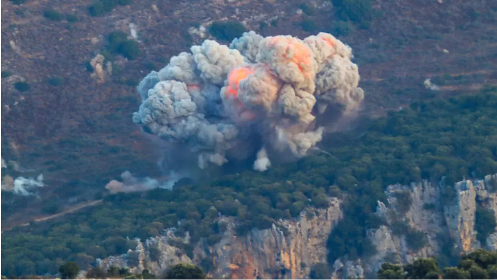 a plume of flame and smoke from an israeli air strike on the marjayoun area in south lebanon near the border rabih daher afp