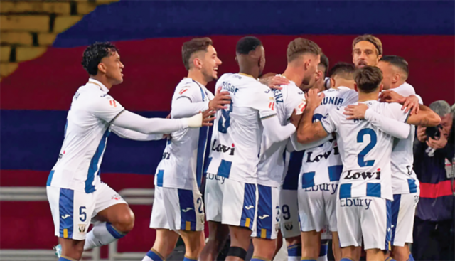leganes stun barca as atletico go level