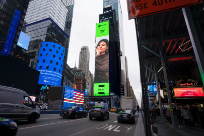 shae gill lights up new york times square