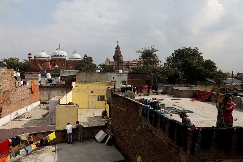 the shahi eidgah mosque and the hindu temple are seen side by side in mathura town in uttar pradesh india january 24 2022 photo reuters