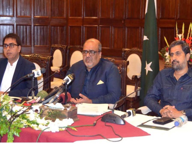 advisor to the prime minister on accountability and interior mirza shahzad akbar and others addressing a press conference in lahore on august 22 2020 photo pid