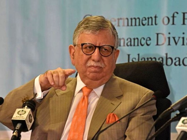 finance minister shaukat fayaz ahmed tarin gestures during a press conference photo afp file