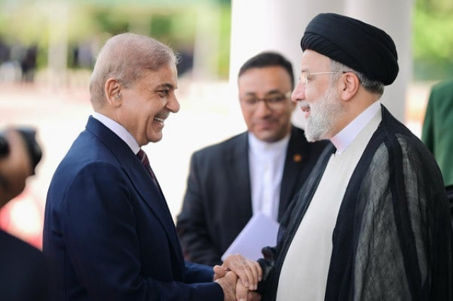 prime minister shehbaz sharif meets iranian president ebrahim raisi photo pmo prime minister shehbaz sharif meets iranian president ebrahim raisi photo pmo
