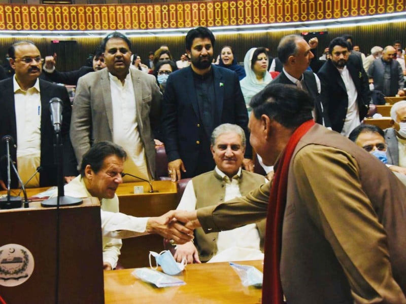 minister for interior sheikh rashid ahmed congratulating prime minister imran khan over winning the vote of confidence from the national assembly photo pid