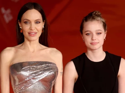 angelina jolie and brad pitt s daughter debuts new name at los angeles fashion event angelina jolie and brad pitt s daughter debuts new name at los angeles fashion event