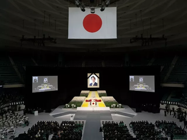 with flowers and a gun salute japan bids farewell to abe at state funeral with flowers and a gun salute japan bids farewell to abe at state funeral