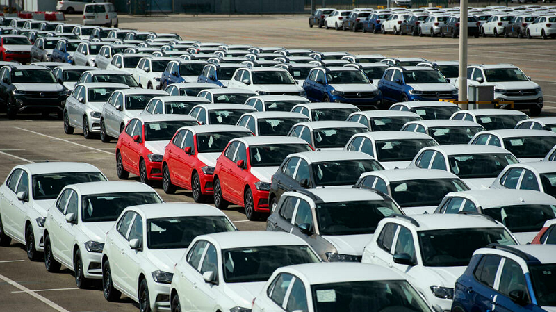 thousands of unfinished cars are seen parked at a volkswagen factory in pamplona spain in may due to the lack of semiconductor supplies photo afp