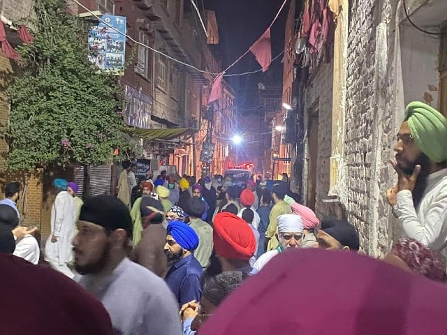 members of sikh community gather to perform last rites of train accident victims in peshawar photo express members of sikh community gather to perform last rites of train accident victims in peshawar photo express