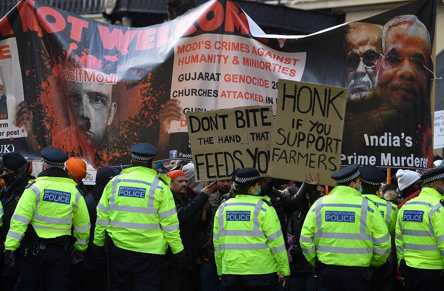 british sikhs gather to protest against india s new farming legislation outside the high commission of india in london britain december 6 2020 photo reuters