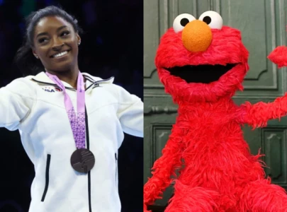 simone biles takes side in elmo s feud with rocco at paris olympics 2024 simone biles takes side in elmo s feud with rocco at paris olympics 2024