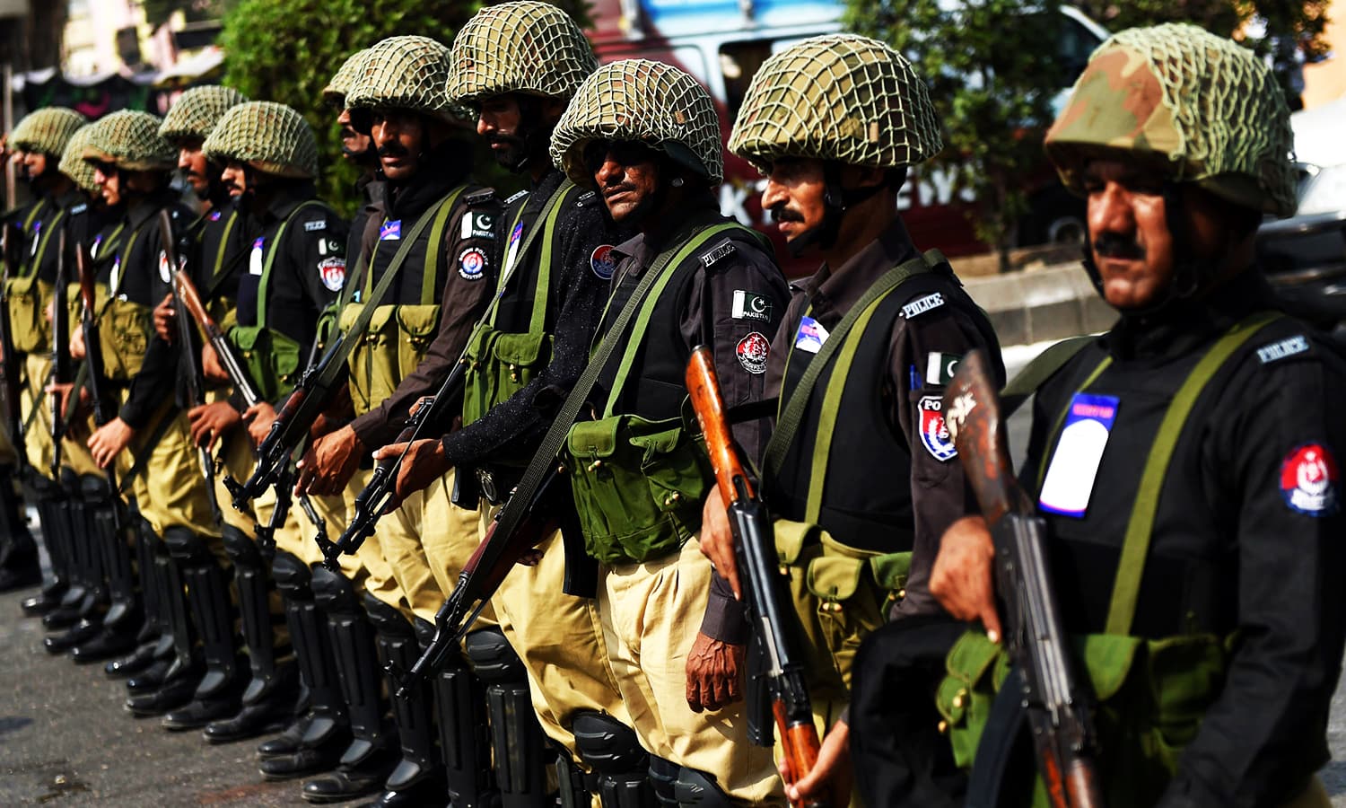 policemen patrol during a procession in karachi photo afp