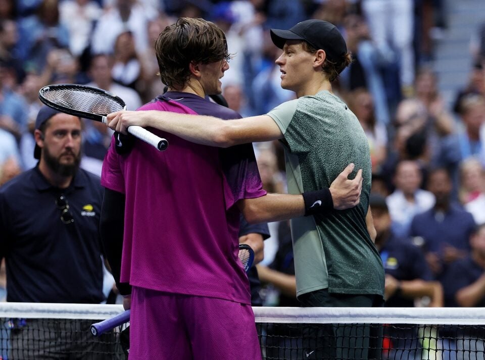 italy s jannik sinner with britain s jack draper after winning their semi final match of us open at flushing meadows new york united states on september 6 2024 photo reuters