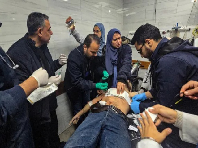 a victim of an israeli attack is treated at kamal adwan hospital one of the few remaining medical facilities in northern gaza on friday photo afp