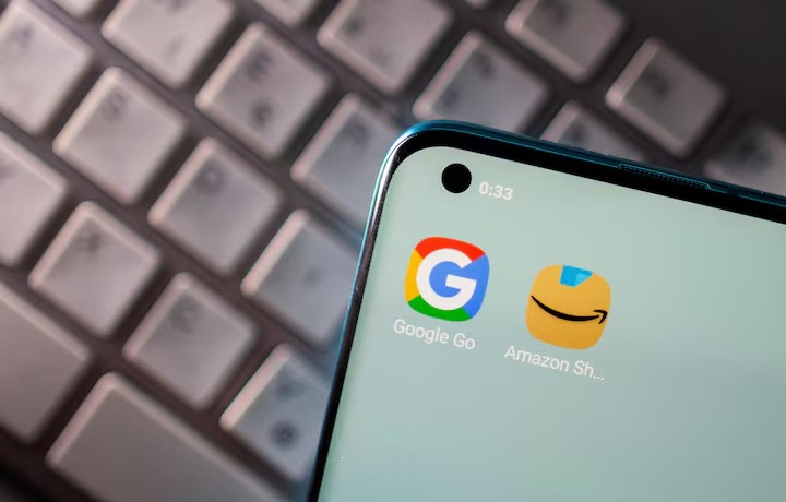 smartphone with google and amazon apps are seen placed on keyboard in this illustration picture taken on june 25 2021 photo reuters