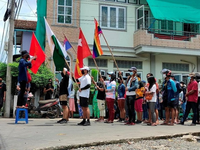 demonstrators carry flags during a protest against the military coup in dawei myanmar april 27 2021 photo reuters