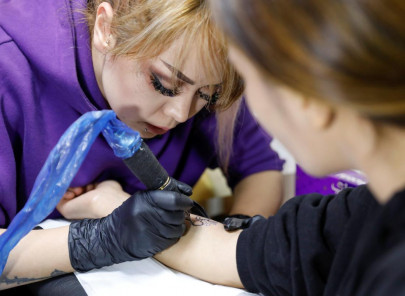 in a first female afghan tattoo artist breaks stereotypes