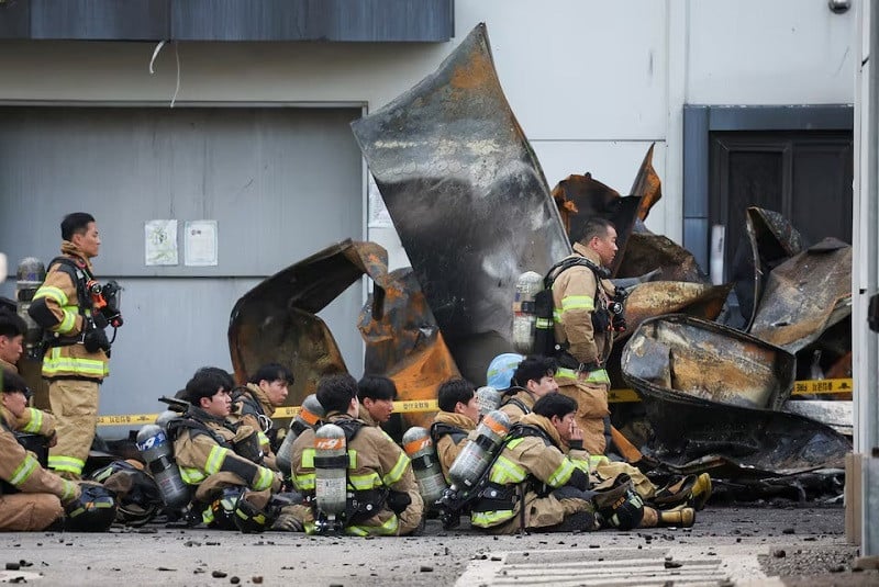 firefighters break as rescue work continues at a lithium battery factory in hwaseong south korea june 24 photo reuters