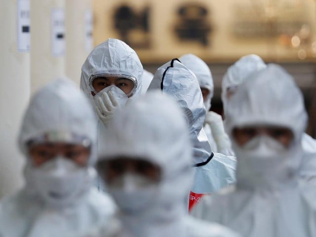 medical workers in protective gears walk into a hospital facility to treat coronavirus patients amid the rise in confirmed cases of coronavirus disease covid 19 in daegu south korea march 8 2020 photo reuters file medical workers in protective gears walk into a hospital facility to treat coronavirus patients amid the rise in confirmed cases of coronavirus disease covid 19 in daegu south korea march 8 2020 photo reuters file