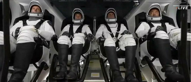 esa european space agency astronaut thomas pesquet nasa astronauts megan mcarthur and shane kimbrough and japan aerospace exploration agency jaxa astronaut akihiko hoshide are inside the capsule ahead of the crew 2 mission at nasa s kennedy space center in florida april 23 2021 photo afp esa european space agency astronaut thomas pesquet nasa astronauts megan mcarthur and shane kimbrough and japan aerospace exploration agency jaxa astronaut akihiko hoshide are inside the capsule ahead of the crew 2 mission at nasa s kennedy space center in florida april 23 2021 photo afp