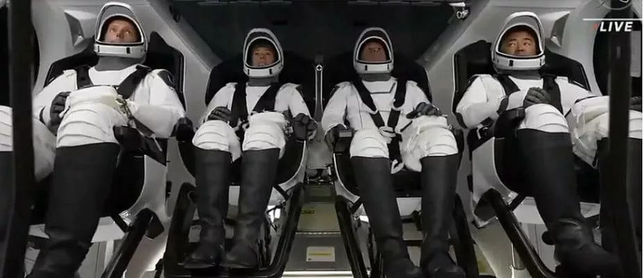 esa european space agency astronaut thomas pesquet nasa astronauts megan mcarthur and shane kimbrough and japan aerospace exploration agency jaxa astronaut akihiko hoshide are inside the capsule ahead of the crew 2 mission at nasa s kennedy space center in florida april 23 2021 photo afp esa european space agency astronaut thomas pesquet nasa astronauts megan mcarthur and shane kimbrough and japan aerospace exploration agency jaxa astronaut akihiko hoshide are inside the capsule ahead of the crew 2 mission at nasa s kennedy space center in florida april 23 2021 photo afp