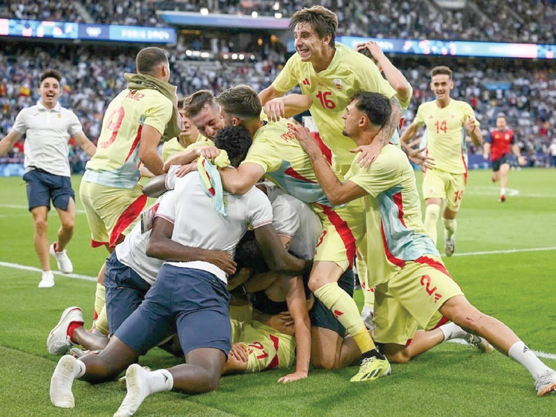 spanish players celebrate their historic victory against france photo afp