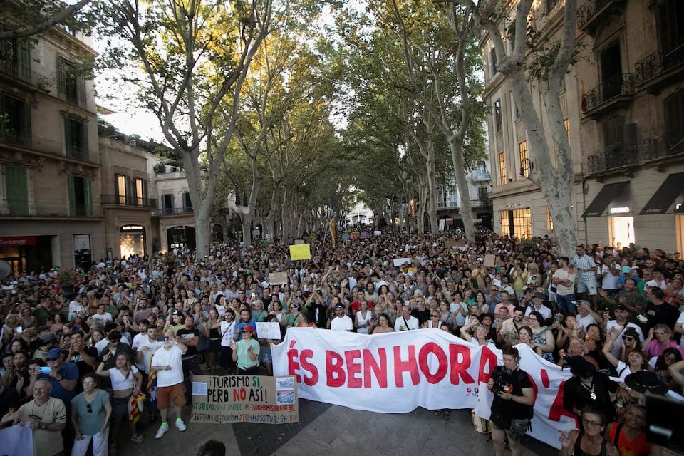 people take part in a protest against mass tourism in palma de mallorca spain on sunday photo reuters