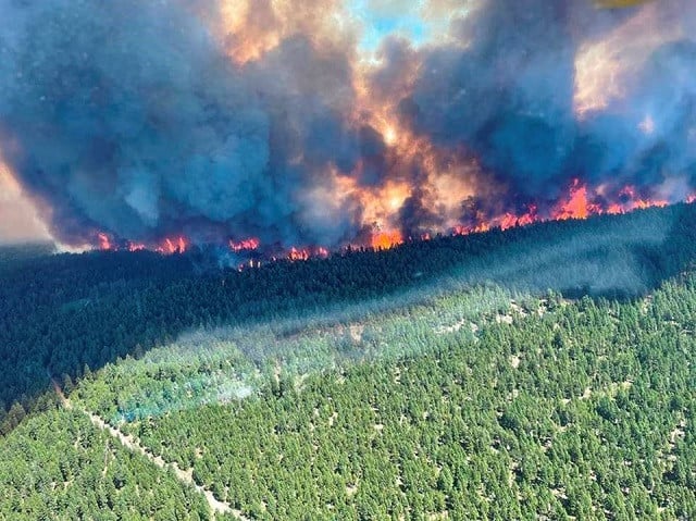 smoke and flames are seen during the sparks lake wildfire at thompson nicola regional district british columbia canada june 29 2021 in this image obtained via social media photo reuters