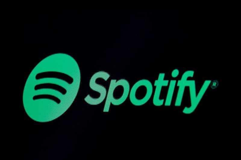 the spotify logo is displayed on a screen on the floor of the new york stock exchange nyse in new york us may 3 2018 photo reuters