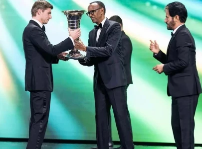 verstappen collects his f1 trophy in rwanda