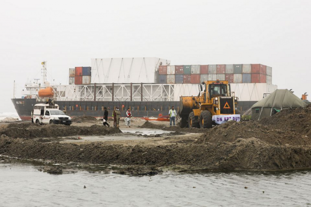 a wheel loader clears the ground near stranded cargo ship mv heng tong 77 at sea view beach in karachi photo reuters a wheel loader clears the ground near stranded cargo ship mv heng tong 77 at sea view beach in karachi photo reuters