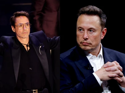 robert downey jr calls for elon musk to control his behavior a little more