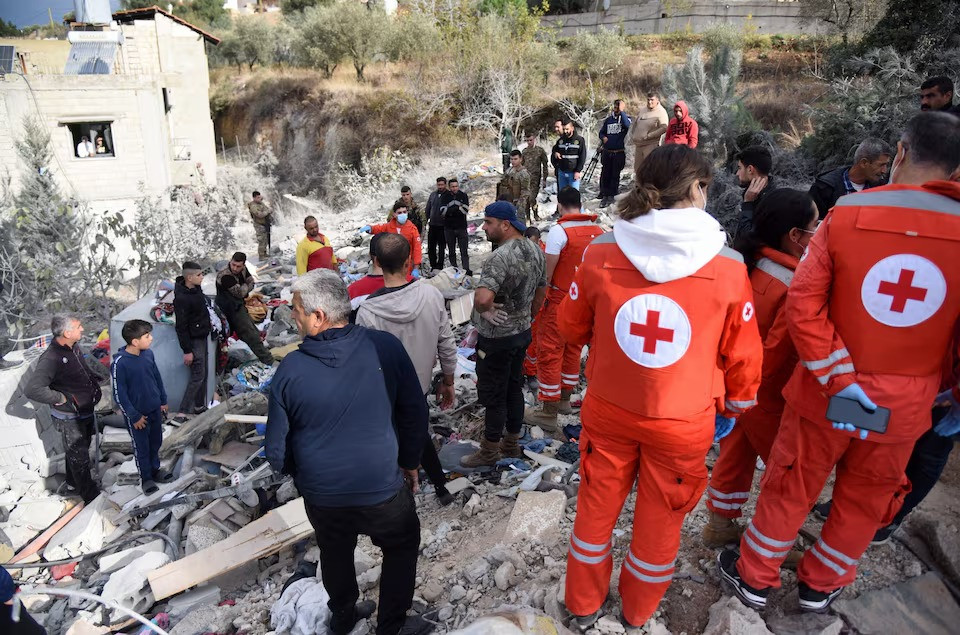 lebanese red cross members work at the site of an israeli airstrike on the northern lebanese town of ain yaaqoub lebanon on november 12 2024 photo reuters