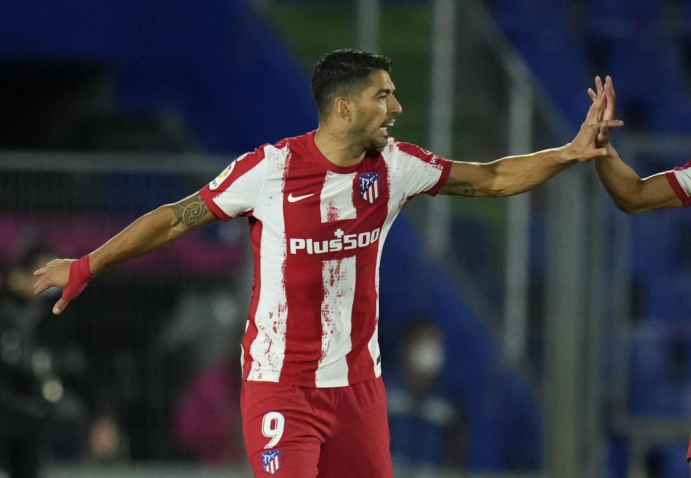 Suarez double hands Atletico comeback victory at Getafe