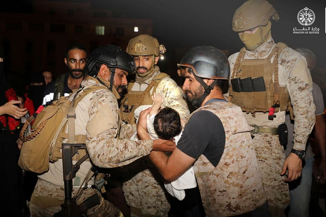 saudi royal navy officers assist a child onboard their navy ship as they evacuate saudis and other nationals are through saudi navy ship from sudan to escape the conflicts port sudan april 22 2023 photo reuters saudi royal navy officers assist a child onboard their navy ship as they evacuate saudis and other nationals are through saudi navy ship from sudan to escape the conflicts port sudan april 22 2023 photo reuters