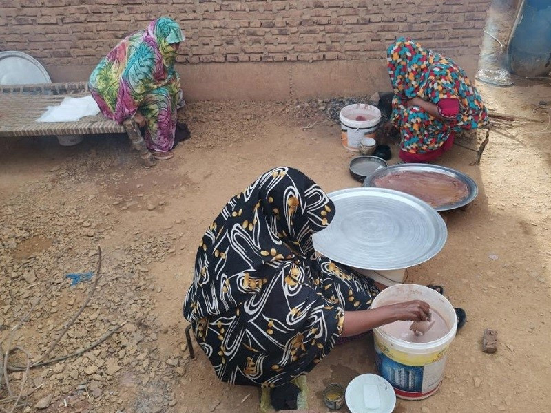 sudanese volunteer women cooking kisra a sorghum bread for displaced families in omdurman city sudan june 24 2024 photo xinhua