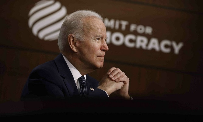 us president joe biden delivers opening remarks for the virtual summit for democracy in the south court auditorium on december 9 in washington dc photo afp