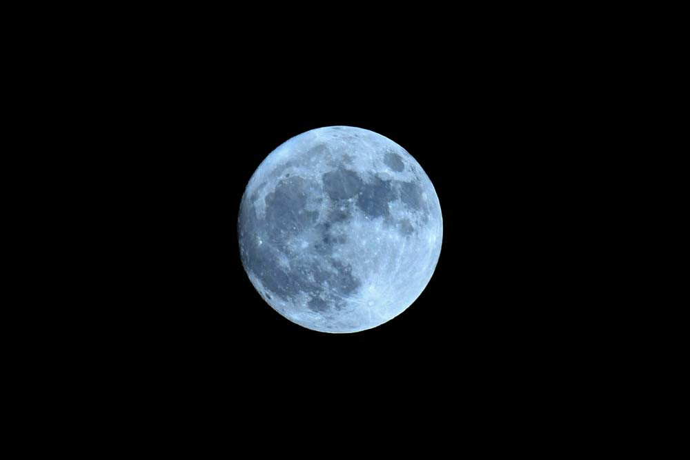 The 'Blue Moon' is pictured above the sky in Kamrup district of Assam on August 30, 2023. PHOTO: AFP