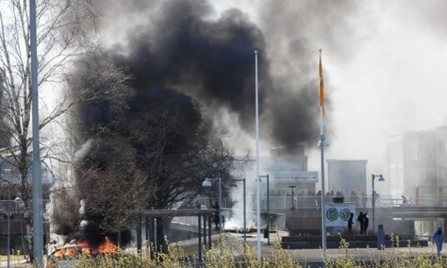 smoke billows from a burning car during a riot ahead of a demonstration planned by danish anti muslim politician rasmus paludan and his stram kurs party which was to include a desecration of the holy quran in navestad norrkoping sweden april 17 photo reuters file smoke billows from a burning car during a riot ahead of a demonstration planned by danish anti muslim politician rasmus paludan and his stram kurs party which was to include a desecration of the holy quran in navestad norrkoping sweden april 17 photo reuters file