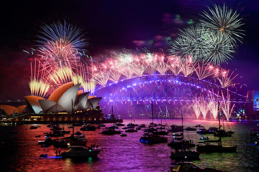 fireworks explode over sydney harbour during new year s eve celebrations in sydney australia january 1 2022 photo reuters