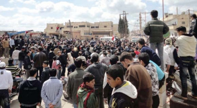 ten killed in protest in south syria official