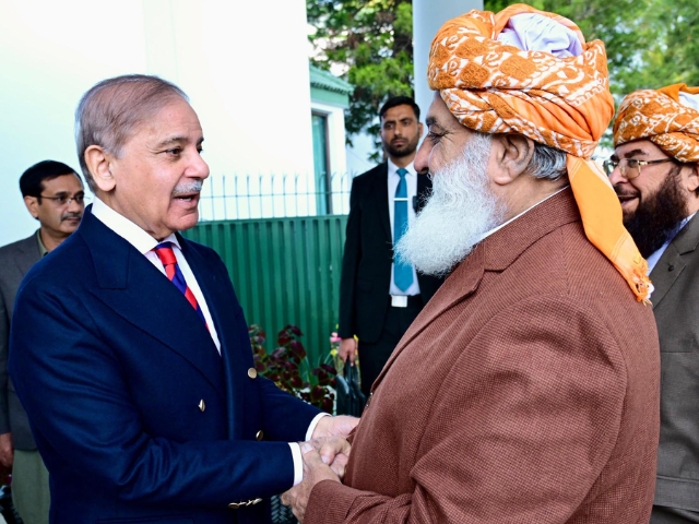 jui f chief maulana fazlur rehman calls on prime minister shehbaz sharif on friday photo pid