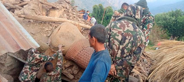 members of the nepal army work during a rescue operation at the ruins of a collapsed house damaged after an earthquake struck early wednesday in the western district of doti nepal november 9 2022 nepal army handout via reuters members of the nepal army work during a rescue operation at the ruins of a collapsed house damaged after an earthquake struck early wednesday in the western district of doti nepal november 9 2022 nepal army handout via reuters