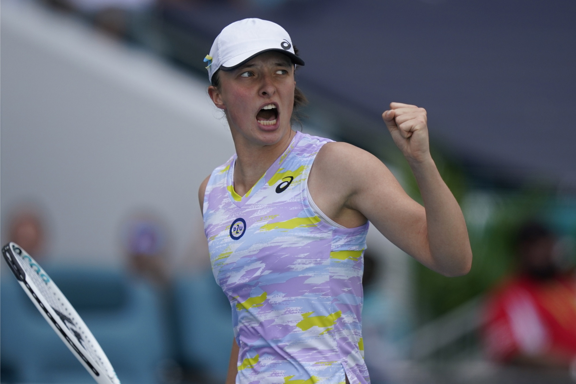 Swiatek urges WTA to continue push for pay equality