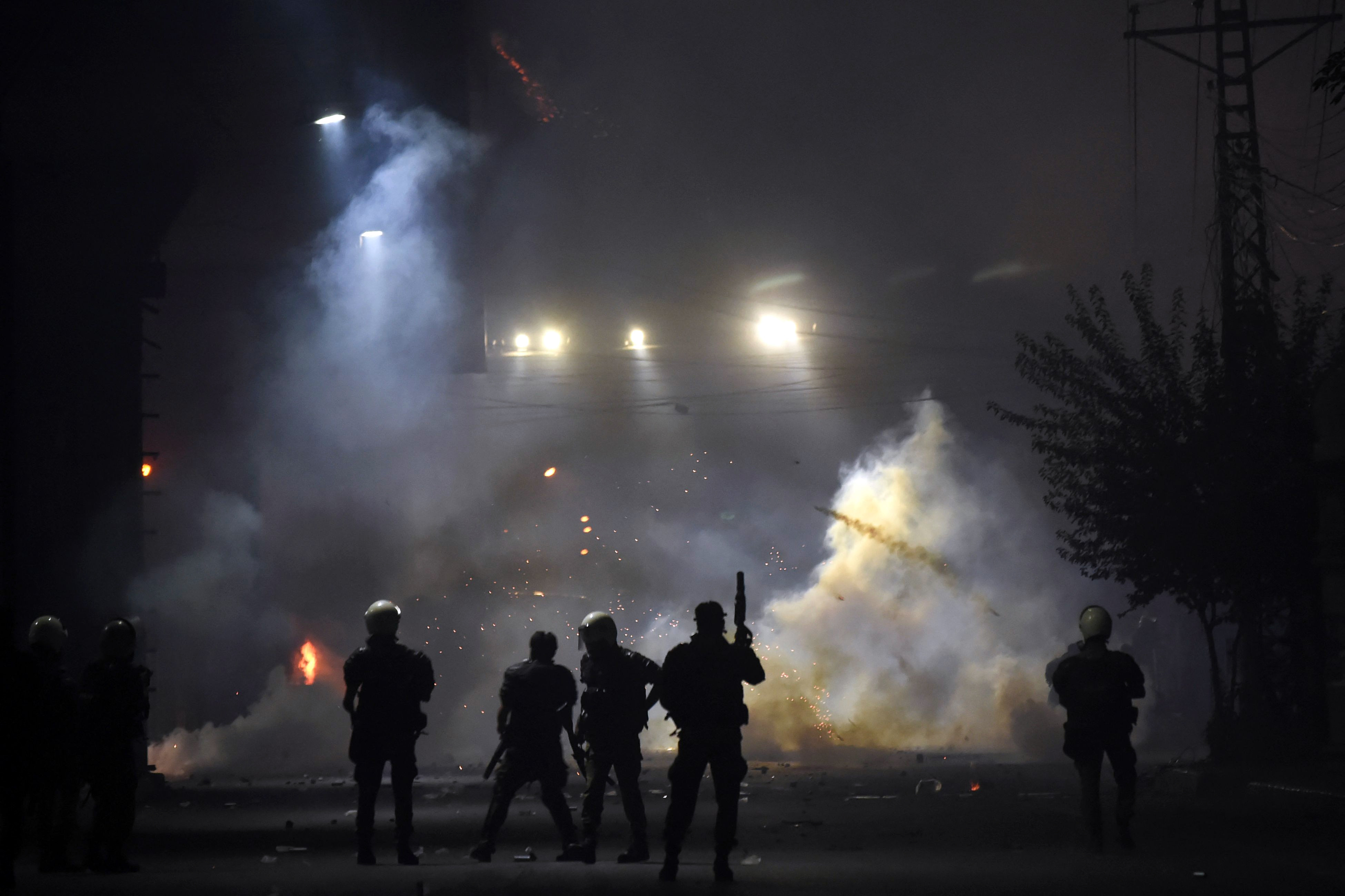 police fire teargas shells on supporters of tlp during a march towards islamabad from lahore on october 22 2021 photo afp