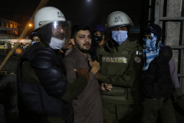 police arrest a tlp worker during the lahore protest on october 22 2021 photo afp police arrest a tlp worker during the lahore protest on october 22 2021 photo afp