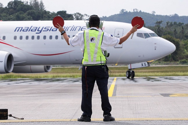 a malaysia airlines plane carrying the first batch of tourists arrives as langkawi reopens to domestic tourists amid the coronavirus disease covid 19 pandemic in malaysia september 16 2021 photo reuters