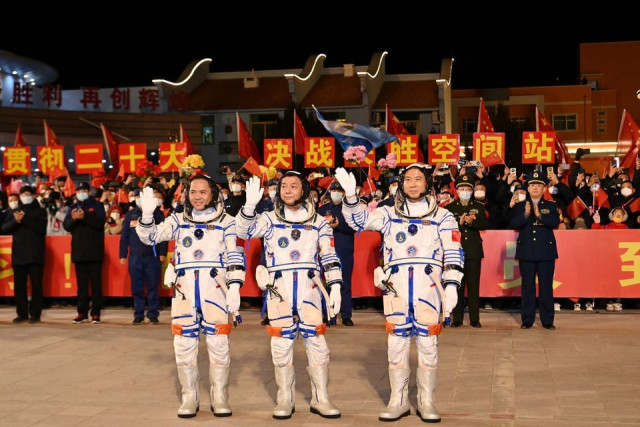astronauts fei junlong deng qingming and zhang lu attend a see off ceremony before the shenzhou 15 spaceflight mission to build china s space station at jiuquan satellite launch center near jiuquan gansu province china september 29 2022 cnsphoto via reuters astronauts fei junlong deng qingming and zhang lu attend a see off ceremony before the shenzhou 15 spaceflight mission to build china s space station at jiuquan satellite launch center near jiuquan gansu province china september 29 2022 cnsphoto via reuters