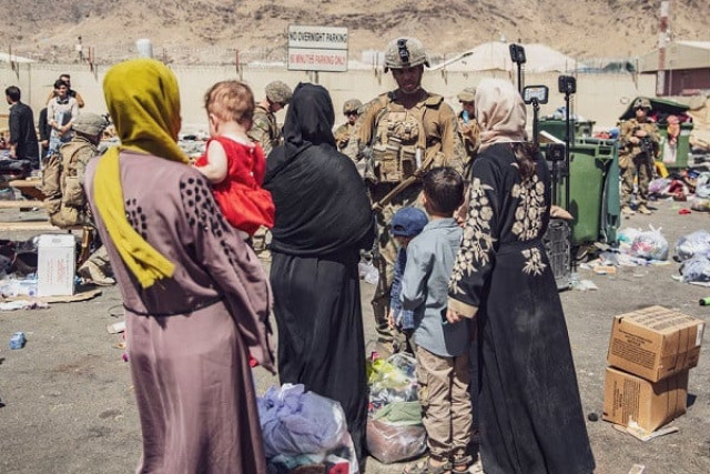 us marines with the 24th marine expeditionary unit meu process evacuees as they go through the evacuation control center ecc during an evacuation at hamid karzai international airport kabul afghanistan august 28 2021 photo reuters us marines with the 24th marine expeditionary unit meu process evacuees as they go through the evacuation control center ecc during an evacuation at hamid karzai international airport kabul afghanistan august 28 2021 photo reuters