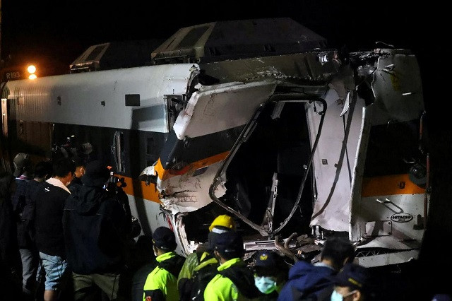 a damaged train carriage is seen at the site of the deadly train derailment at a tunnel north of hualien taiwan april 4 2021 photo reuters