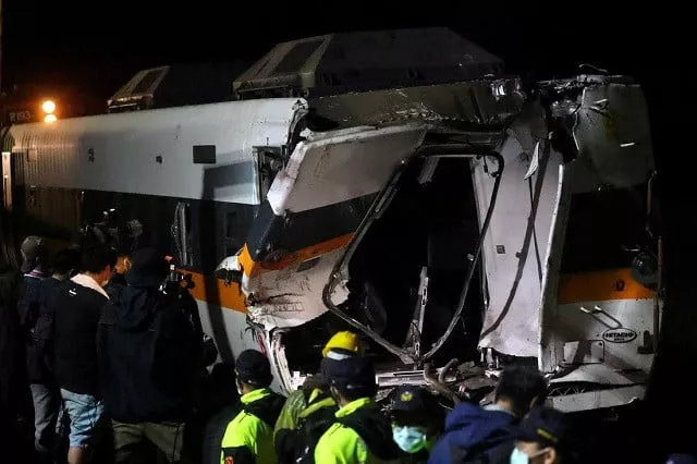 a damaged train carriage is seen at the site of the deadly train derailment at a tunnel north of hualien taiwan april 4 2021 photo reuters a damaged train carriage is seen at the site of the deadly train derailment at a tunnel north of hualien taiwan april 4 2021 photo reuters